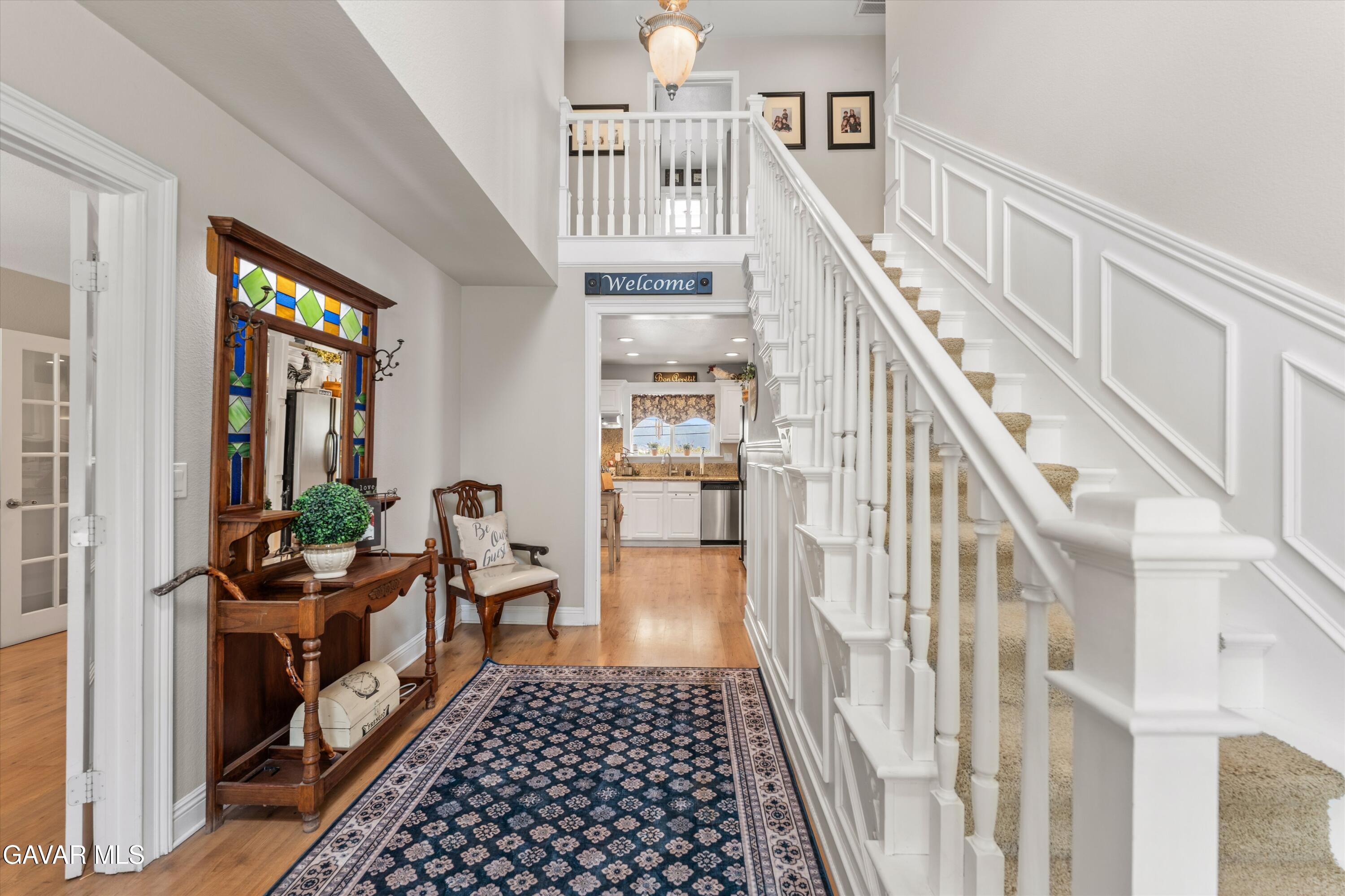 27450 Harness Drive Tehachapi, CA 93561 - Photo 41 of 44 a hallway with a dining table and chairs