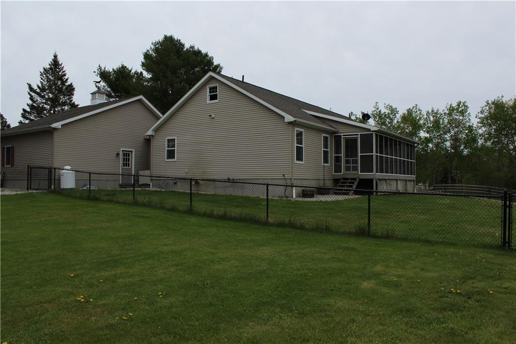 516 Kansas Road Milbridge, ME 04658 - Photo 31 of 34 Side view of the home with fenced in...