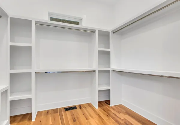a view of an empty walk in closet