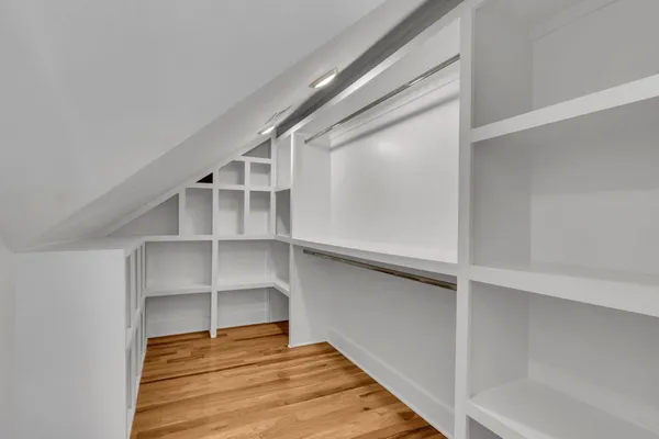 a view of an empty walk in closet