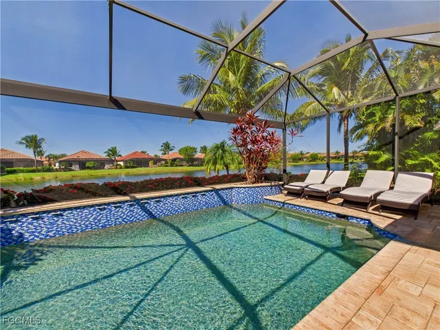 a view of a backyard with plants and a patio