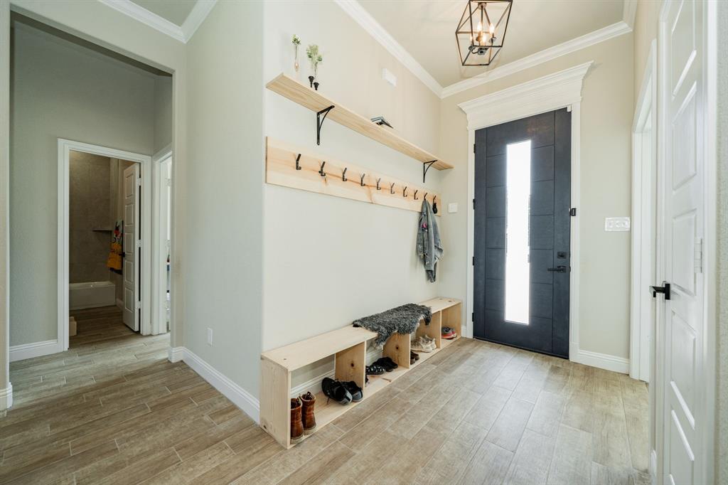 2000 Sweet Springs Road Weatherford, TX 76088 - Photo 22 of 40 a view of an entryway with wooden floor