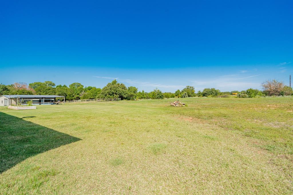 2000 Sweet Springs Road Weatherford, TX 76088 - Photo 34 of 40 a view of a lake with houses in the background