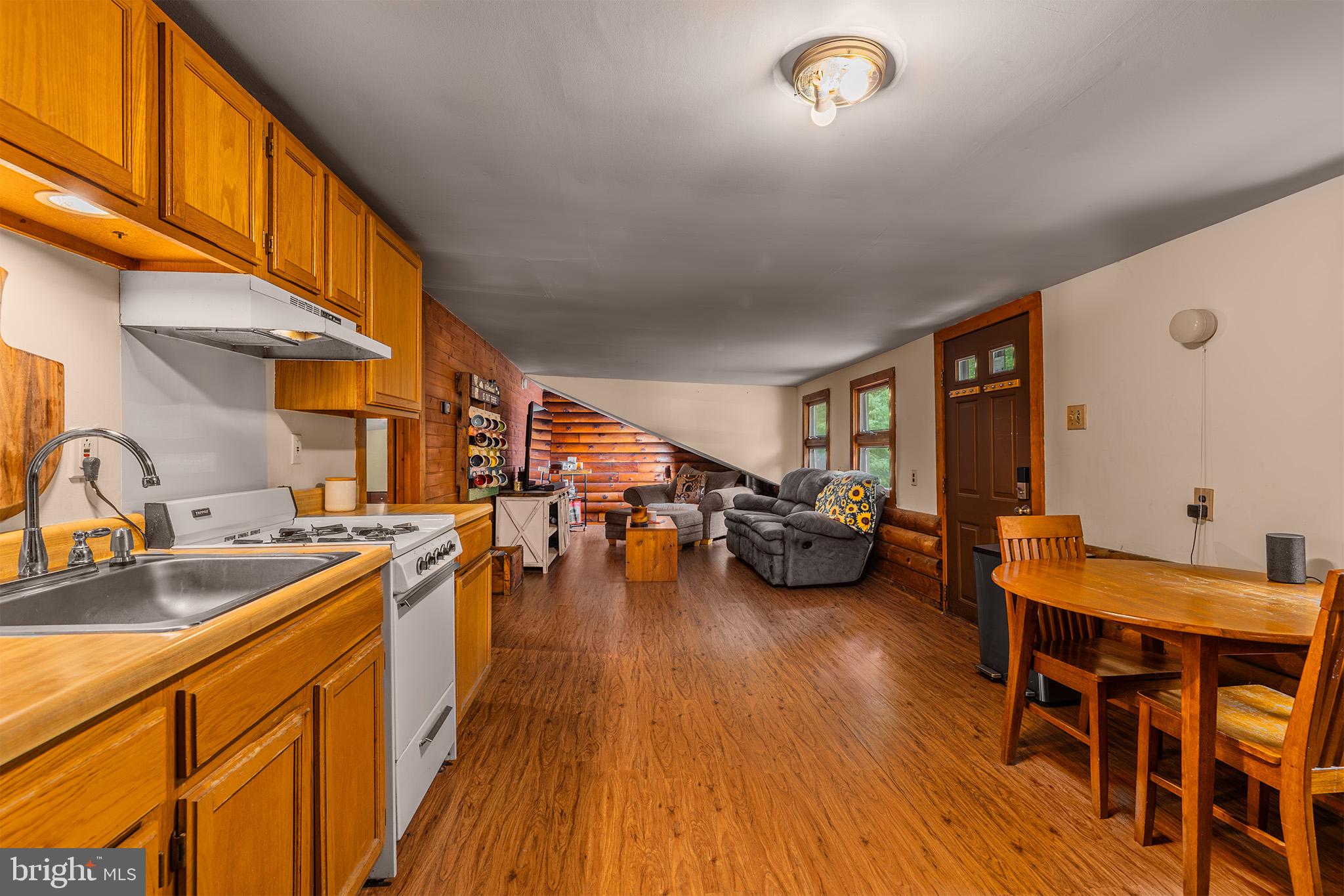 385 Upper Neck Road Pittsgrove, NJ 08318 - Photo 22 of 29 a living room with furniture and a wooden floor