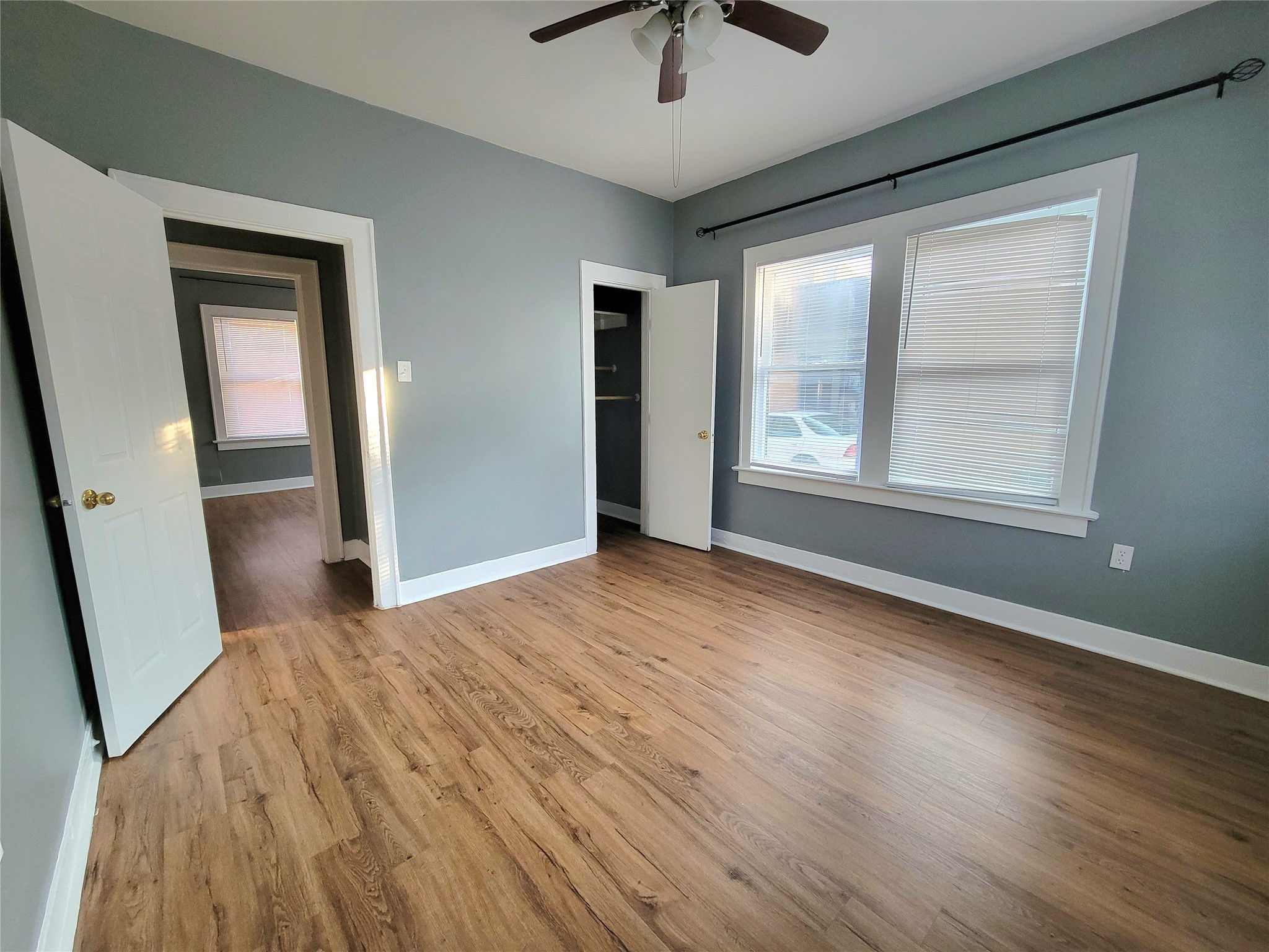 2811 Chenevert Street Houston, TX 77004 - Photo 21 of 26 a view of empty room with wooden floor and fan