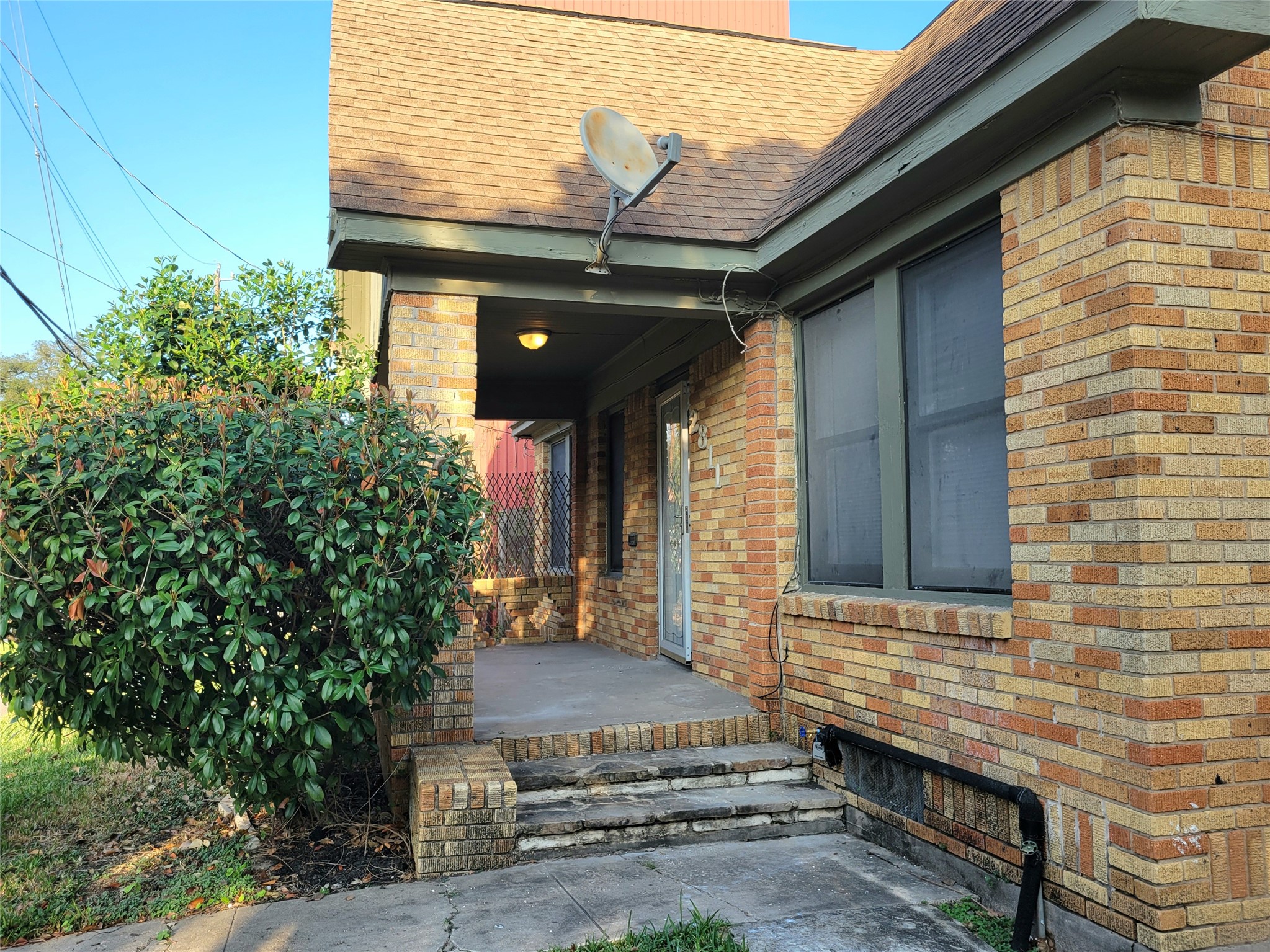 2811 Chenevert Street Houston, TX 77004 - Photo 3 of 26 a view of house with outdoor space and trees