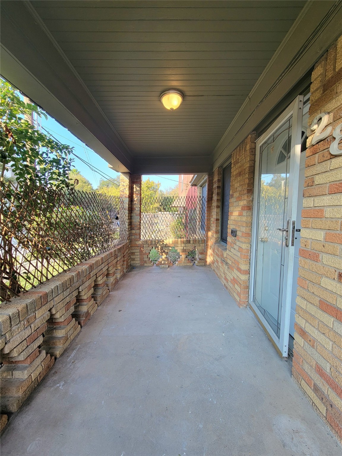 2811 Chenevert Street Houston, TX 77004 - Photo 4 of 26 a view of hallway with mountain view and wooden floor