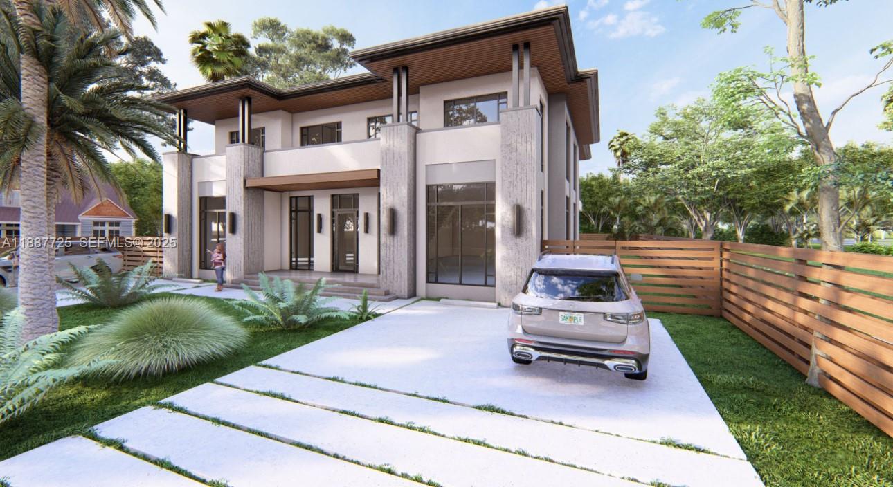 5240 Southwest 106th Avenue Miami, FL 33165 - Photo 5 of 8 a white house that has a tree in front of it