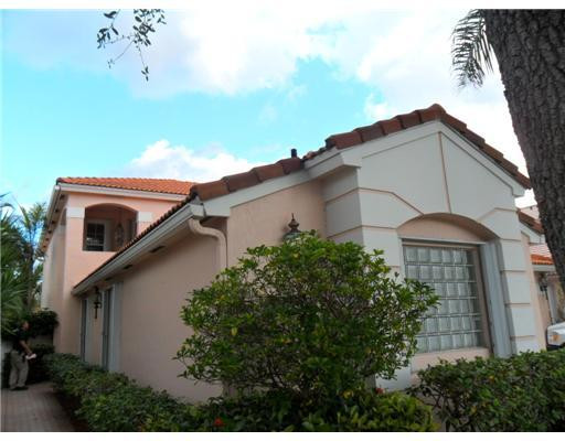 6361 Brava Way Boca Raton, FL 33433 - Photo 1 of 13 a backyard of a house with lots of green space