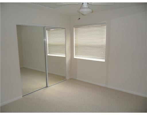 6361 Brava Way Boca Raton, FL 33433 - Photo 12 of 13 a view of an empty room with a window