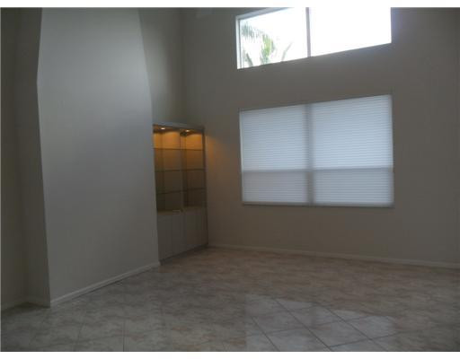 6361 Brava Way Boca Raton, FL 33433 - Photo 4 of 13 a view of an empty room and window