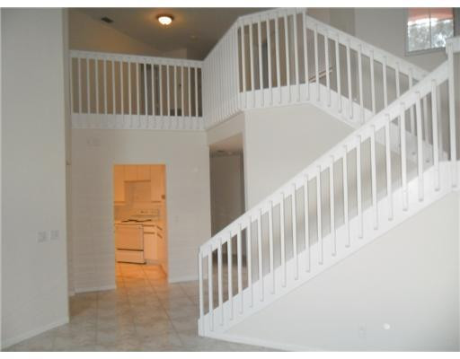 6361 Brava Way Boca Raton, FL 33433 - Photo 5 of 13 a view of entryway with wooden floor