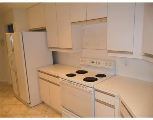6361 Brava Way Boca Raton, FL 33433 - Photo 6 of 13 a utility room with dryer and washer