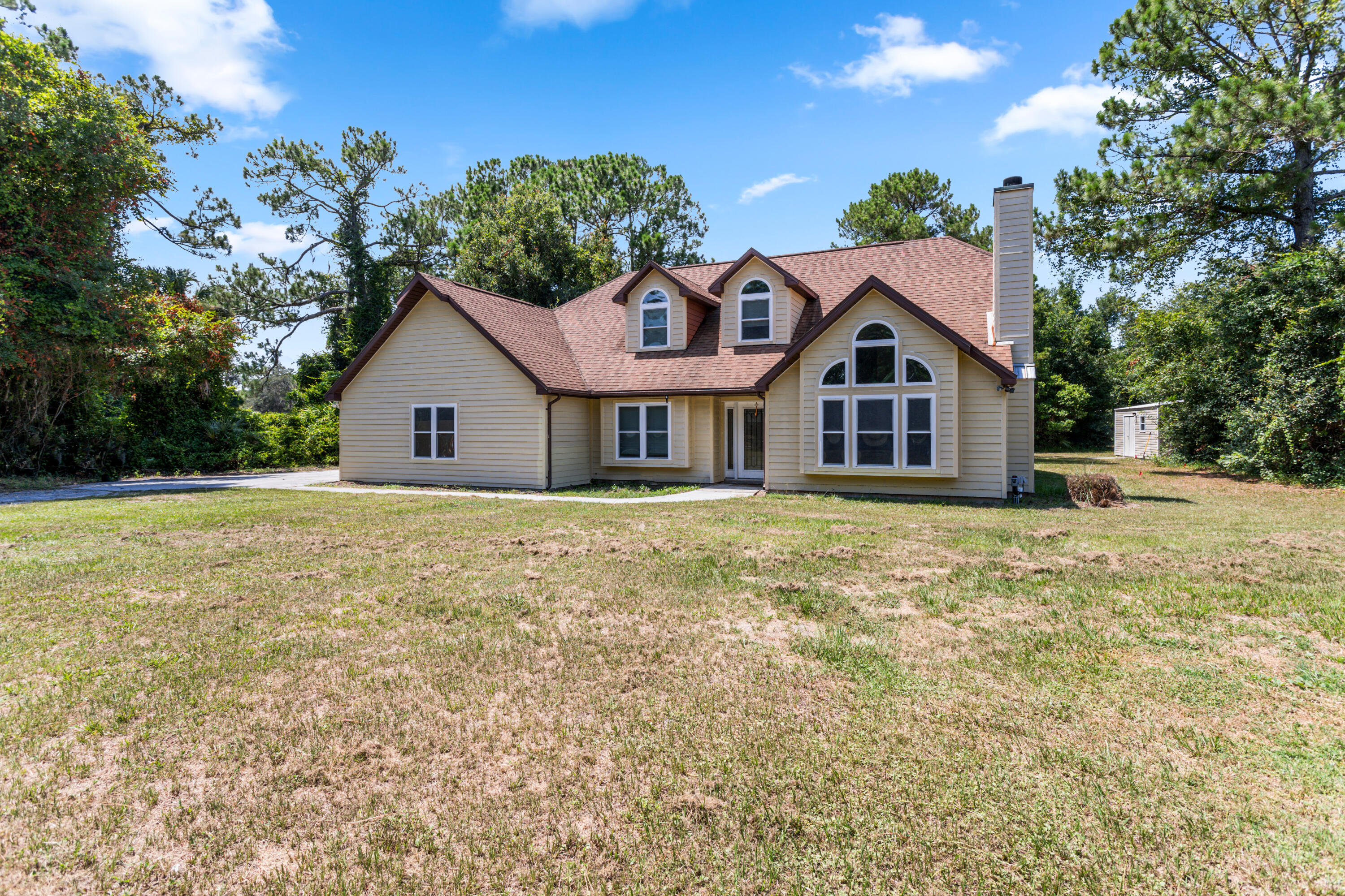 4152 Fairfax Drive Mims, FL 32754 - Photo 2 of 45 Front of house from the side