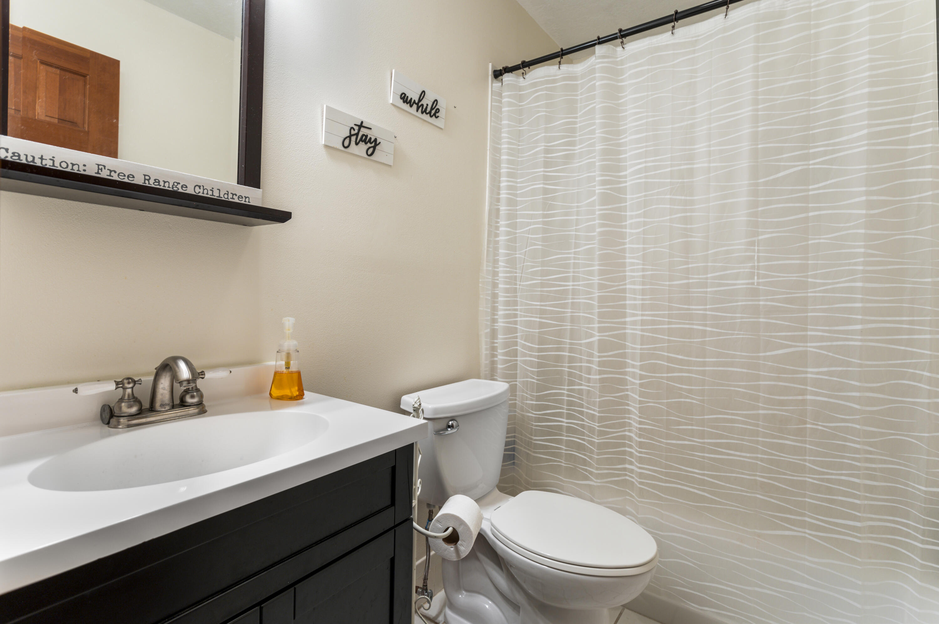 4152 Fairfax Drive Mims, FL 32754 - Photo 32 of 45 Guest bathroom upstairs