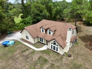 4152 Fairfax Drive Mims, FL 32754 - Photo 9 of 45 dji_fly_20240726_132840_0136_17219270430