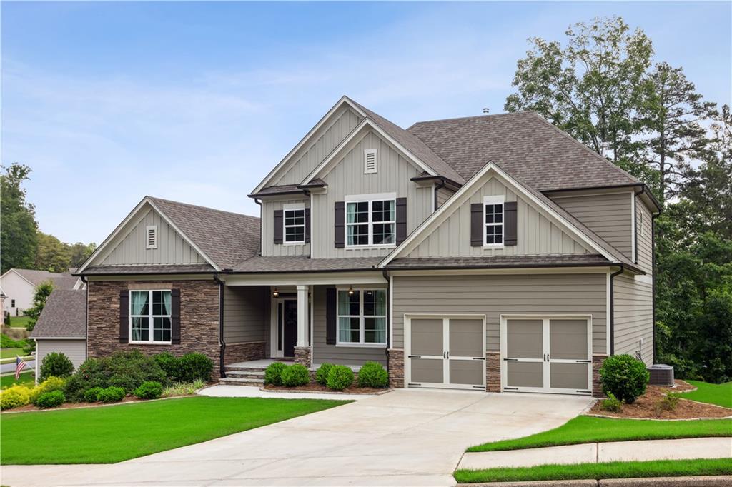 front view of a house and a yard