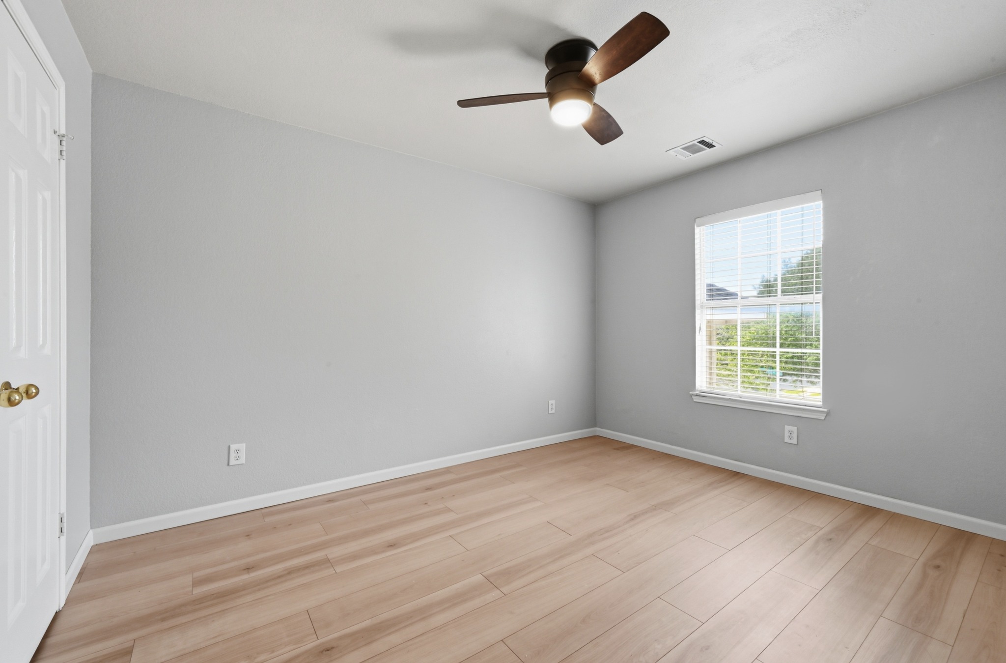 2700 Cradlerock Terrace Austin, TX 78748 - Photo 22 of 29 wooden floor in an empty room with a window