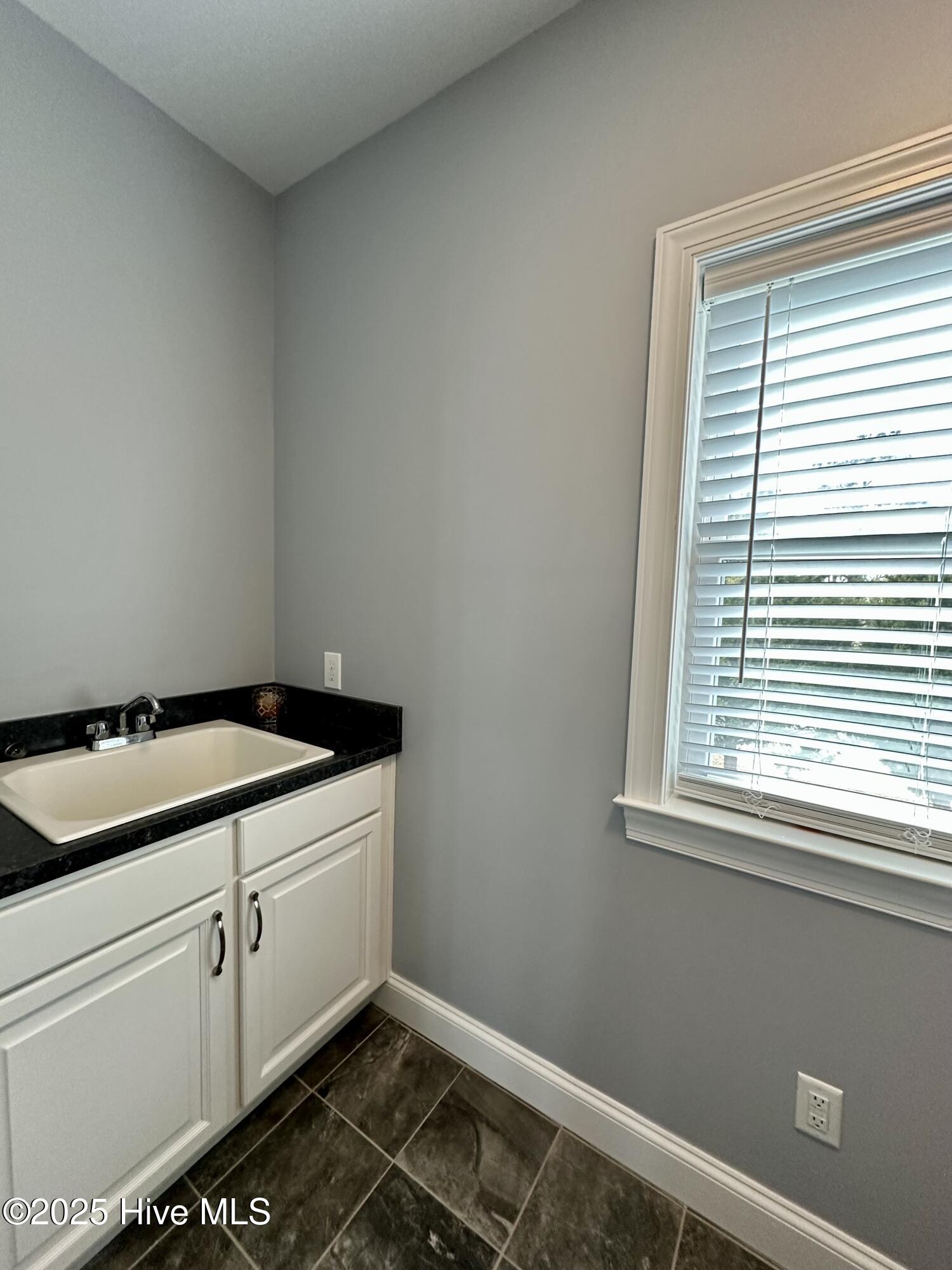299 Breezy Banks Road Roper, NC 27970 - Photo 33 of 58 Laundry sink