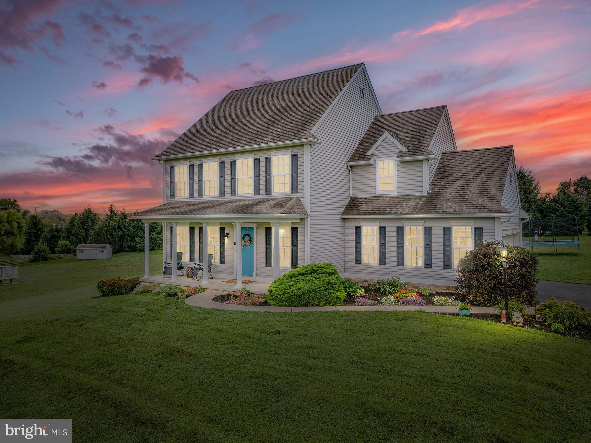 2 Anthony Court Peach Bottom, PA 17563 - Photo 1 of 42 a front view of a house with a yard table and chairs