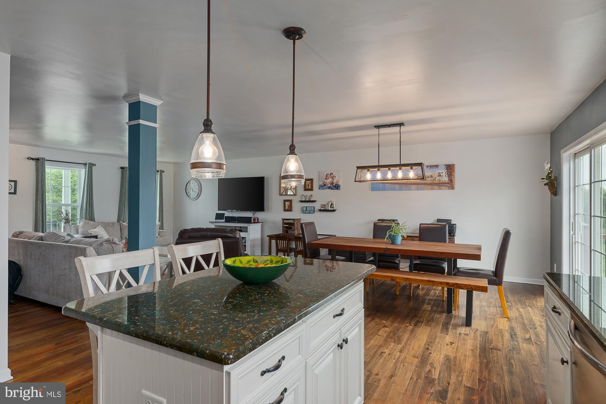 2 Anthony Court Peach Bottom, PA 17563 - Photo 12 of 42 a kitchen with a table chairs and a wooden floor
