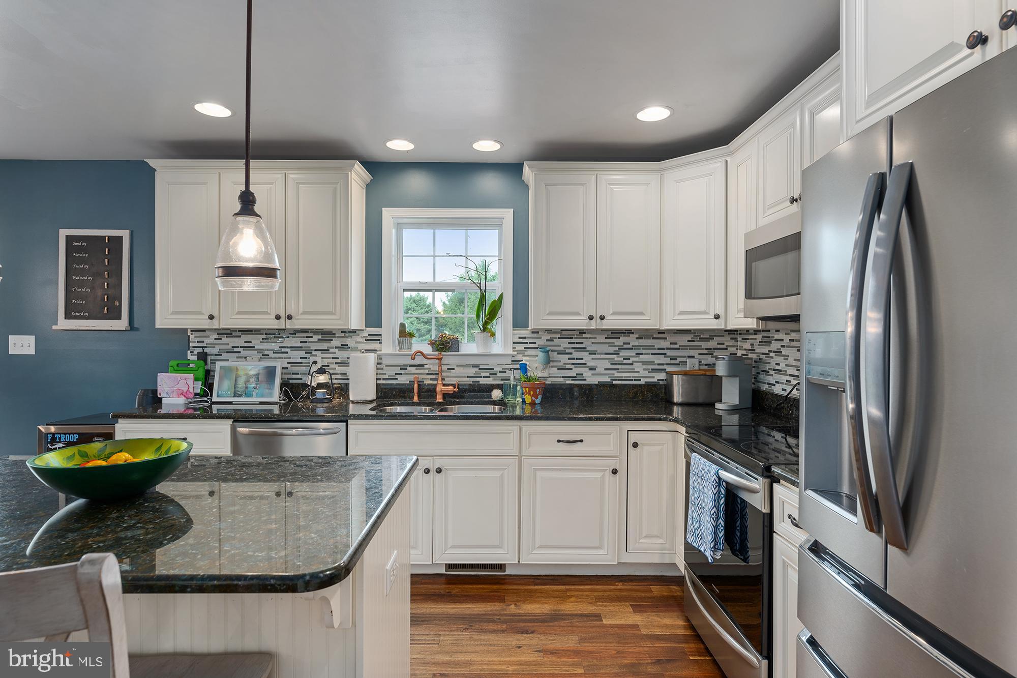 2 Anthony Court Peach Bottom, PA 17563 - Photo 13 of 42 a kitchen with sink cabinets and stainless steel appliances