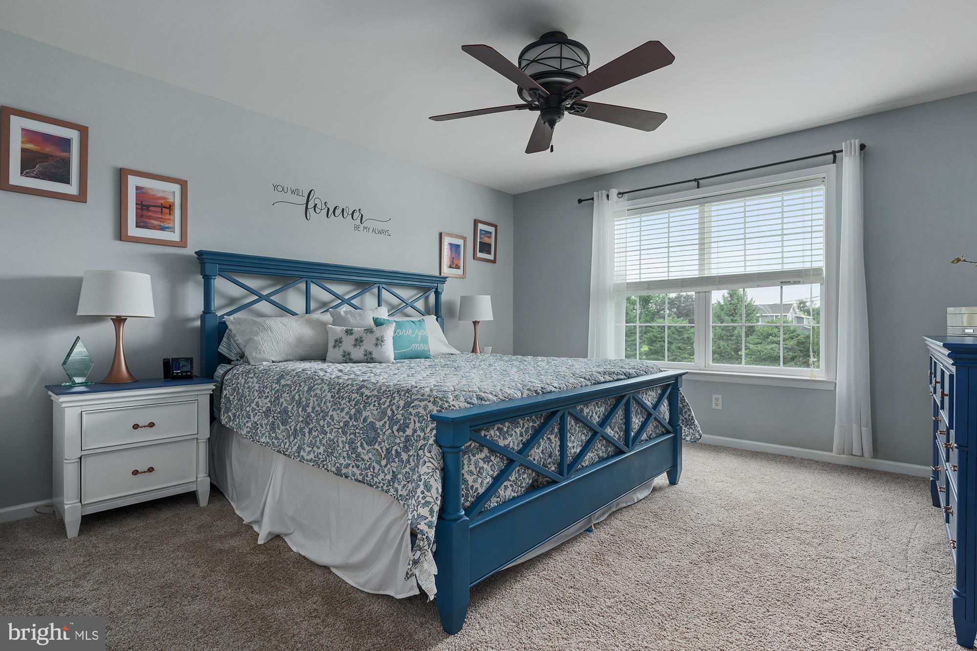 2 Anthony Court Peach Bottom, PA 17563 - Photo 17 of 42 a spacious bedroom with a bed and a window