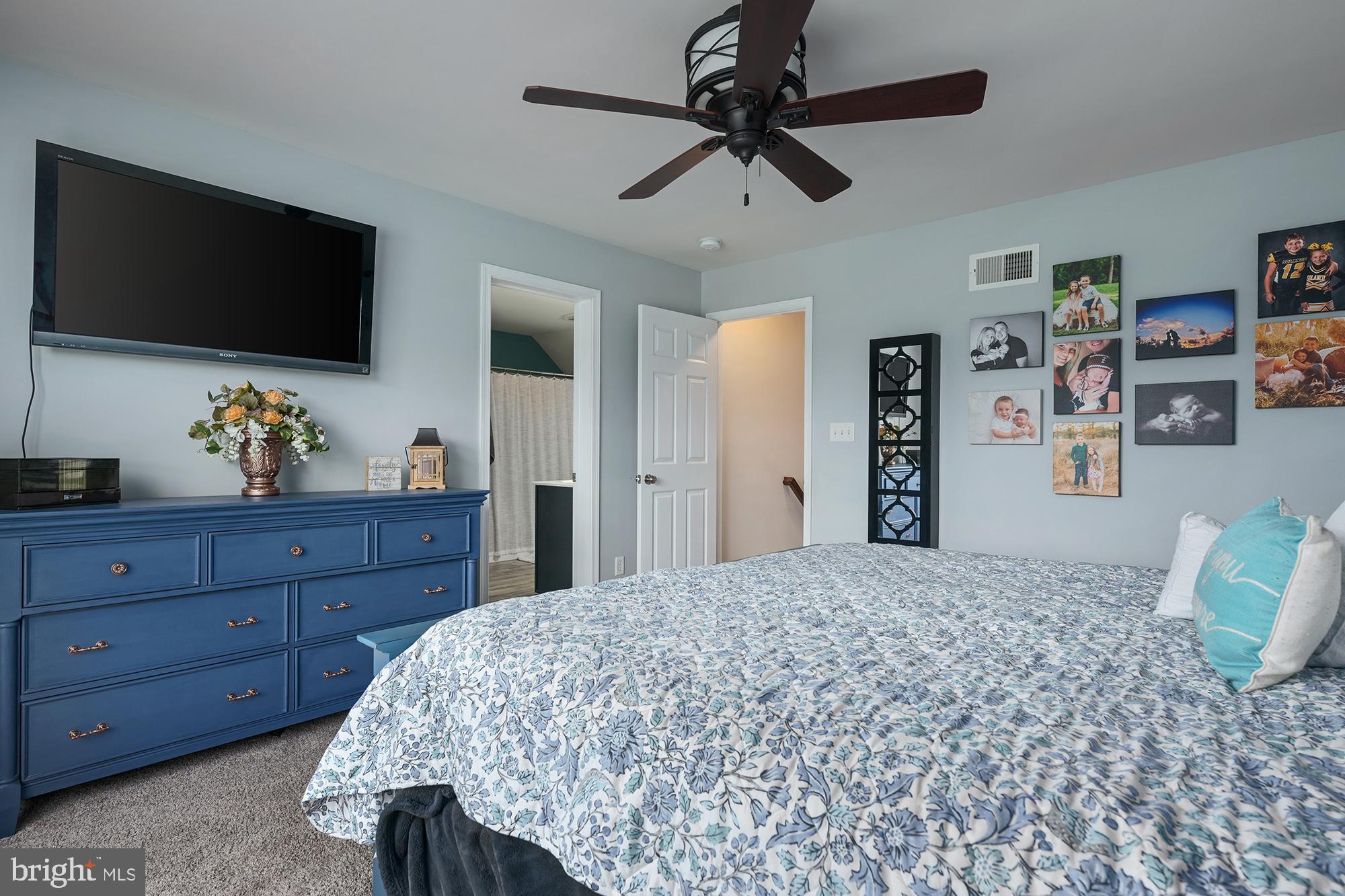 2 Anthony Court Peach Bottom, PA 17563 - Photo 18 of 42 a bedroom with a bed and a flat screen tv