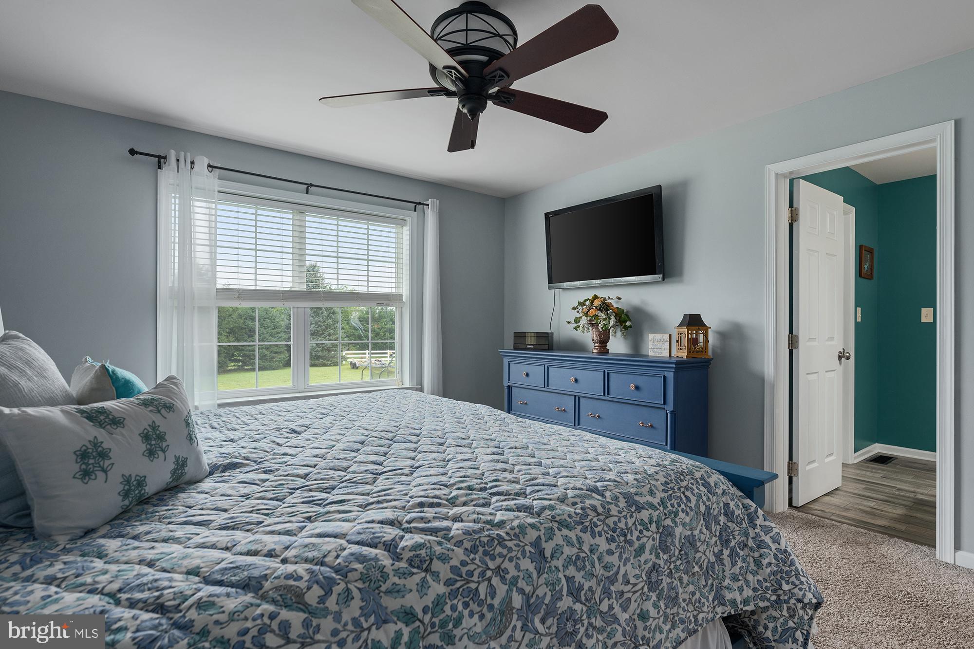 2 Anthony Court Peach Bottom, PA 17563 - Photo 19 of 42 a bedroom with a bed and a flat screen tv