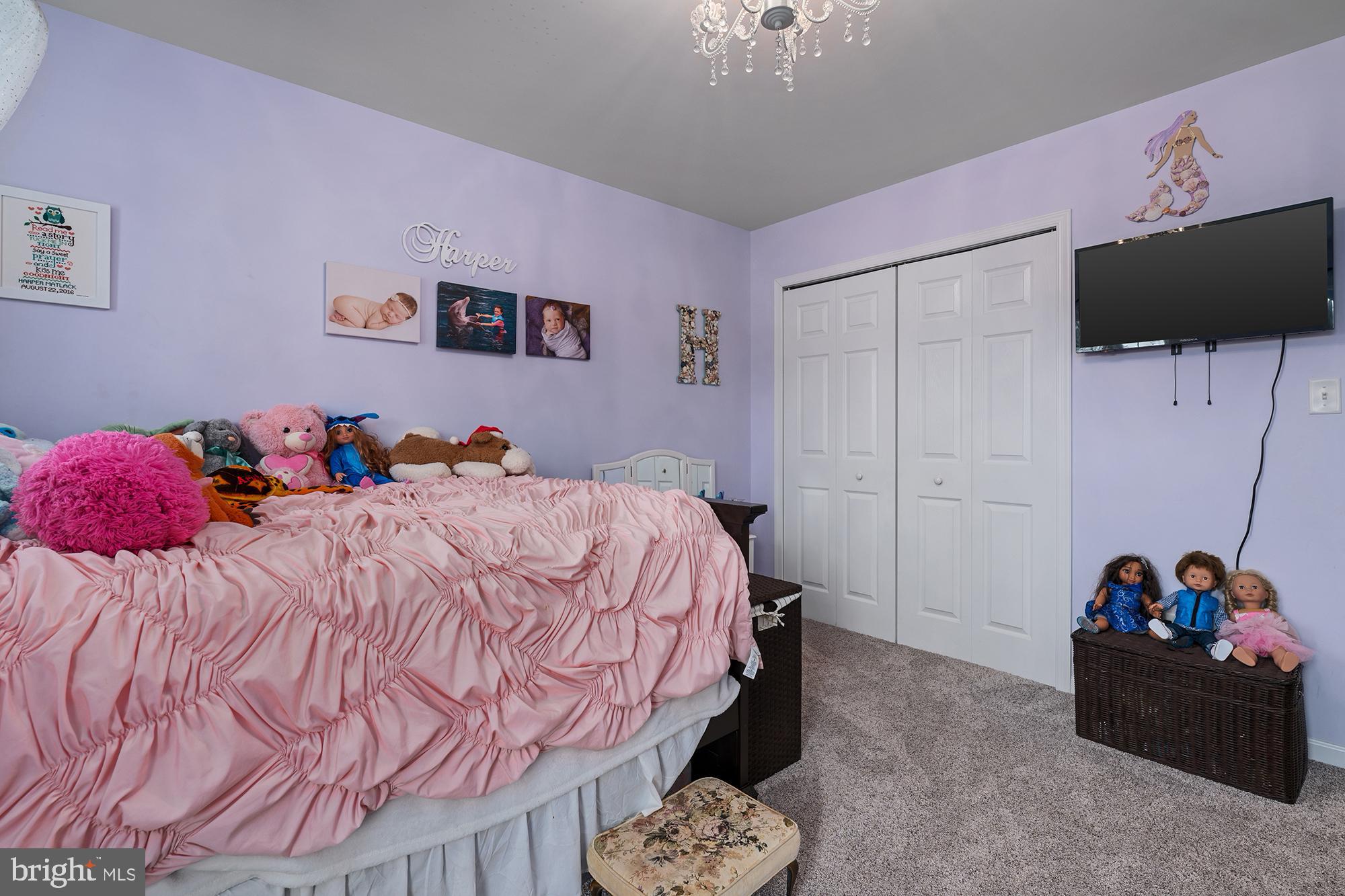 2 Anthony Court Peach Bottom, PA 17563 - Photo 27 of 42 a bedroom with a bed and a flat screen tv