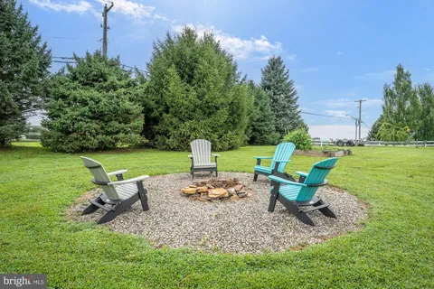 a view of a park with houses
