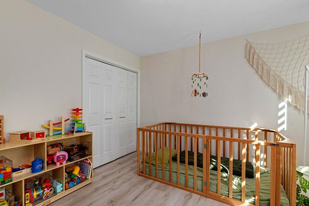 1368 Bluewater Road Harrisonburg, VA 22801 - Photo 30 of 52 a view of kids room with toys and wooden floor