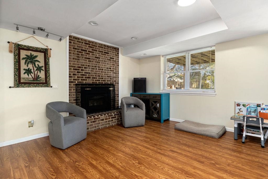 1368 Bluewater Road Harrisonburg, VA 22801 - Photo 35 of 52 a living room with furniture and a fireplace