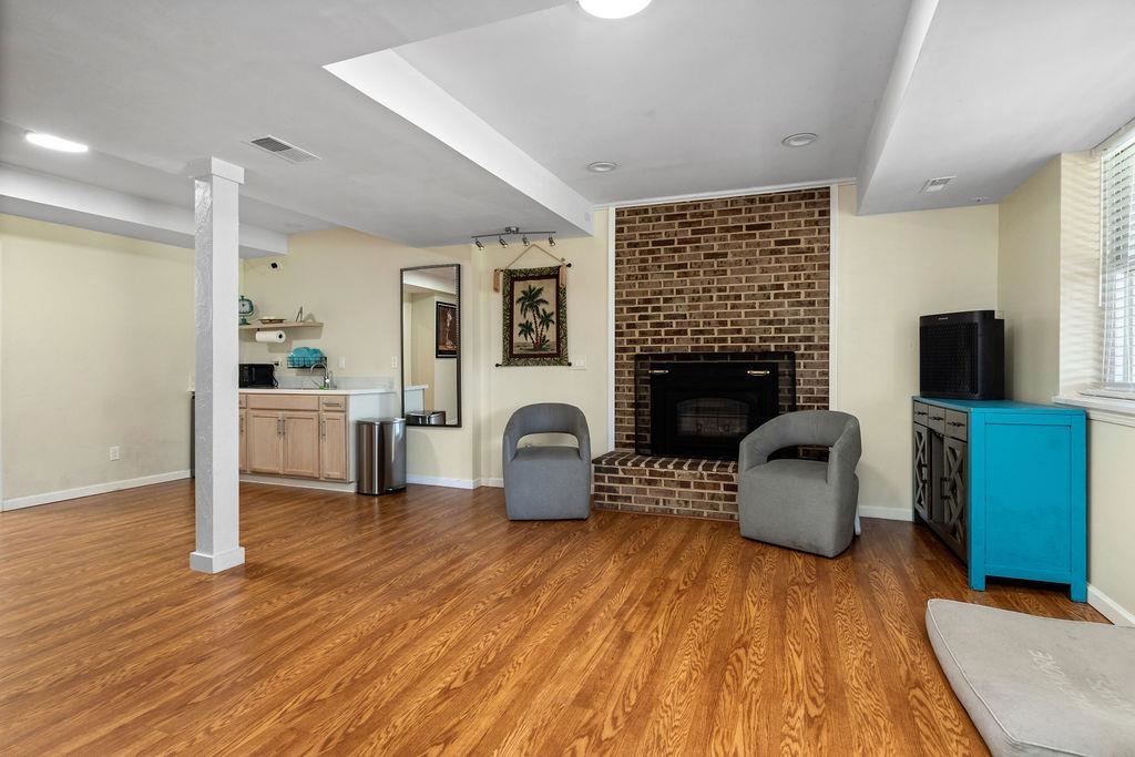 1368 Bluewater Road Harrisonburg, VA 22801 - Photo 36 of 52 a living room with furniture and a fireplace