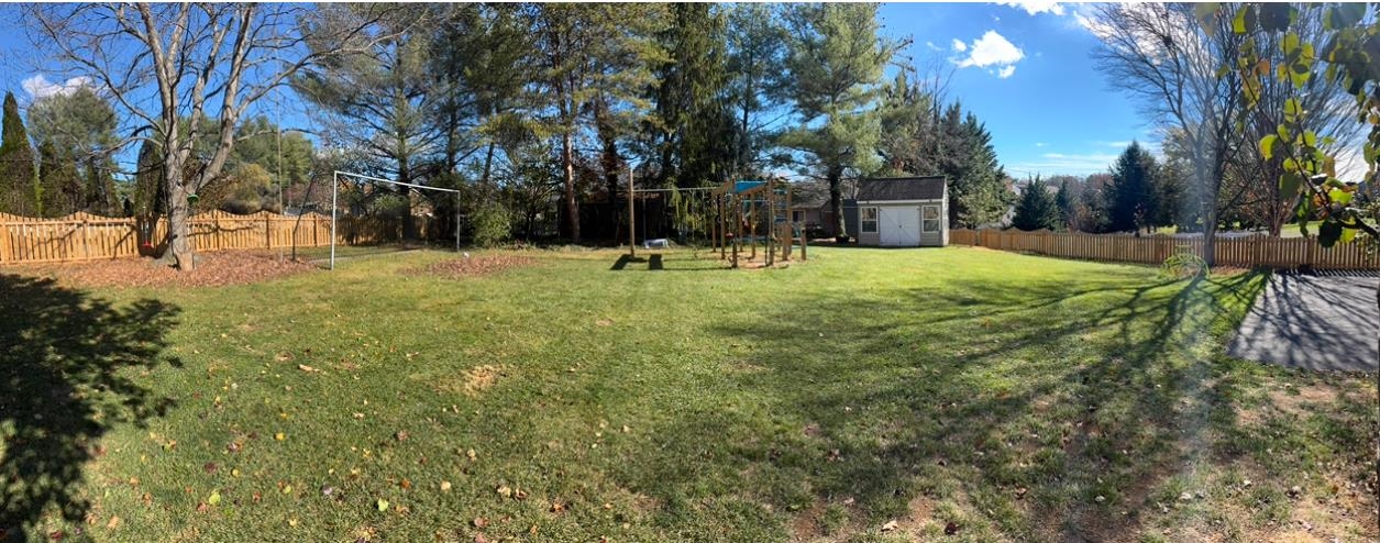 1368 Bluewater Road Harrisonburg, VA 22801 - Photo 50 of 52 a backyard of apartments with large trees