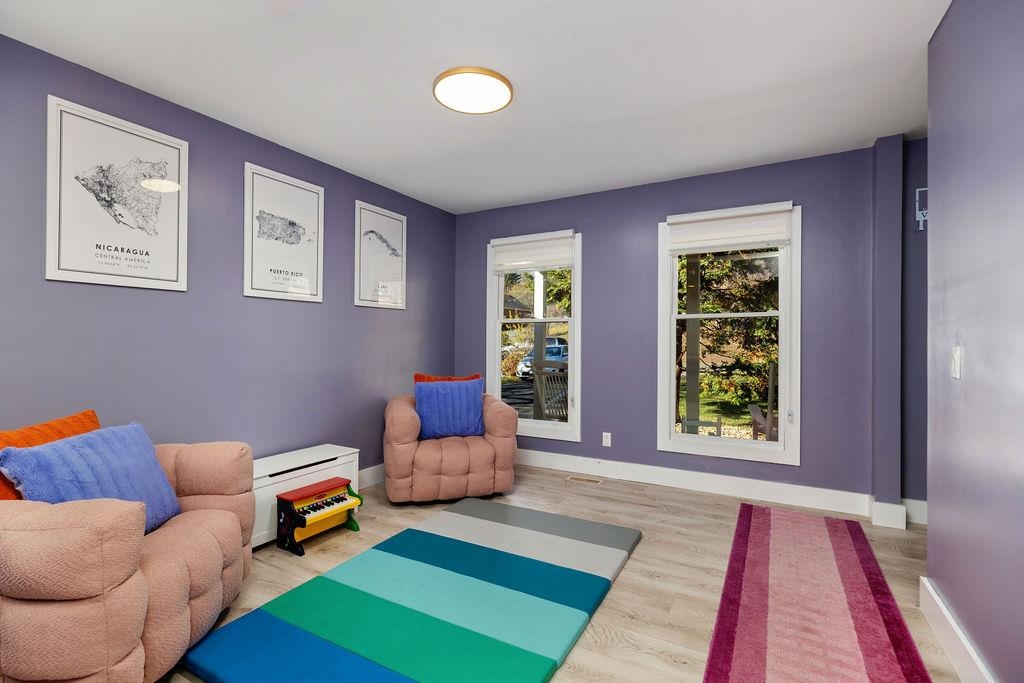 1368 Bluewater Road Harrisonburg, VA 22801 - Photo 6 of 52 a living room with furniture and a rug