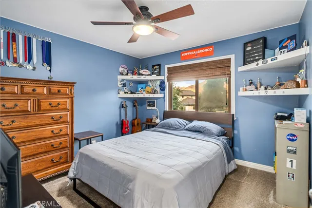 a view of swimming pool with an outdoor seating