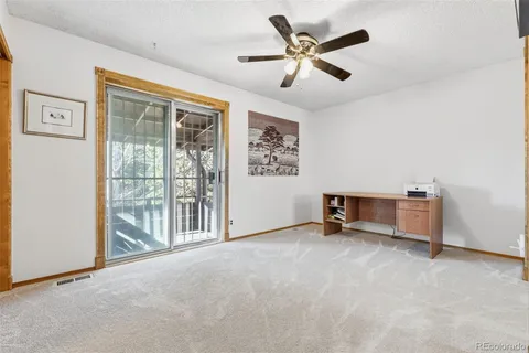 a view of a livingroom with furniture