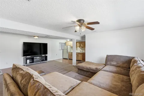 a living room with a couch and a flat screen tv