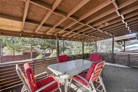 a view of trees and sky from a window