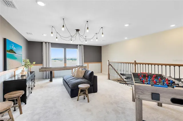 a work room with furniture and windows