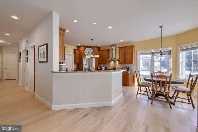 a living room with furniture fireplace and flat screen tv