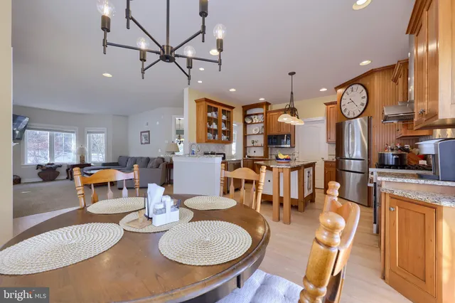 a view of entryway with a chandelier