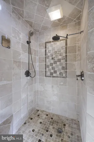 a front view of a house with large windows