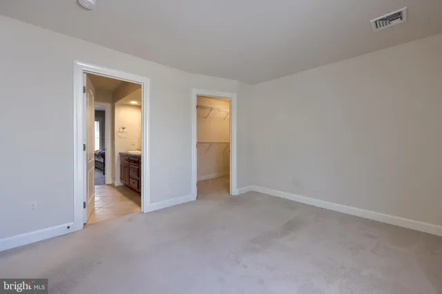 an aerial view of a house with lots of residential buildings