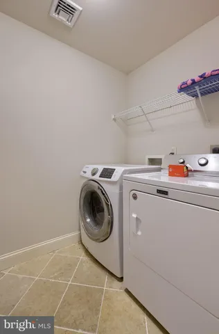 an aerial view of a city with lots of residential buildings