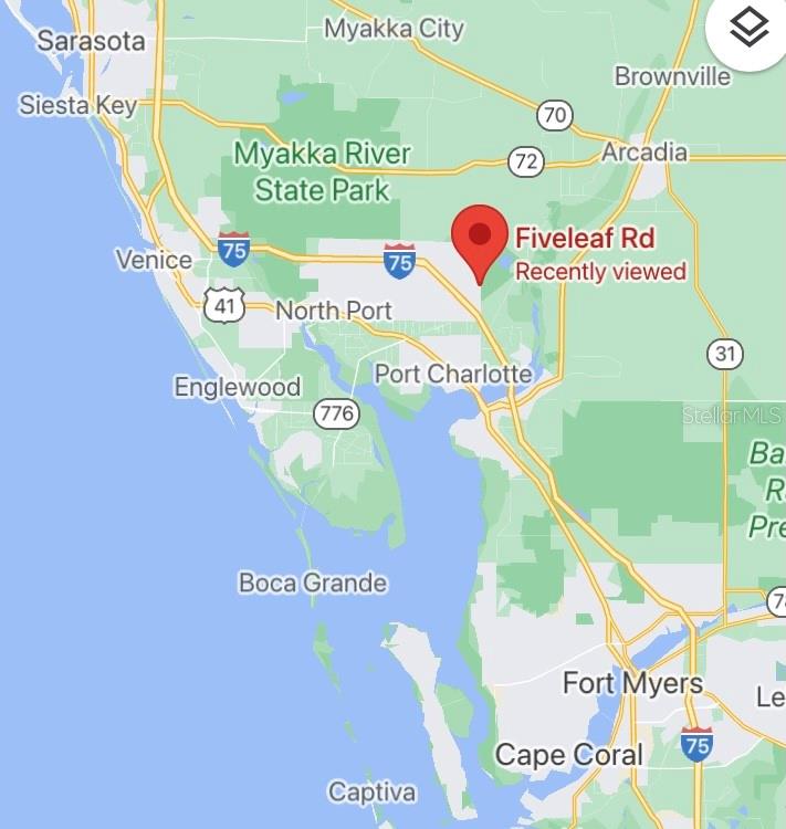 Fiveleaf Rd Port North Port, FL 34288 - Photo 5 of 5 a close up of a sign board