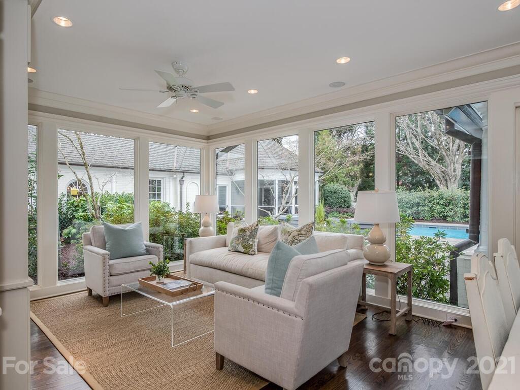 3422 Sharon Road Charlotte, NC 28211 - Photo 14 of 48 a living room with furniture and windows