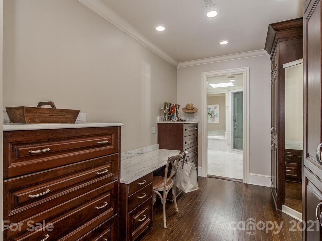 3422 Sharon Road Charlotte, NC 28211 - Photo 22 of 48 a view of a workspace with furniture and wooden floor