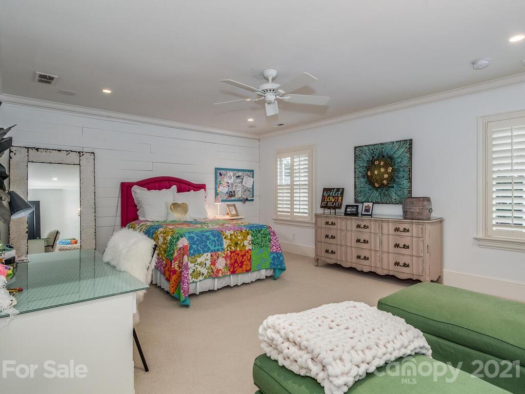 3422 Sharon Road Charlotte, NC 28211 - Photo 34 of 48 a bedroom with furniture and window